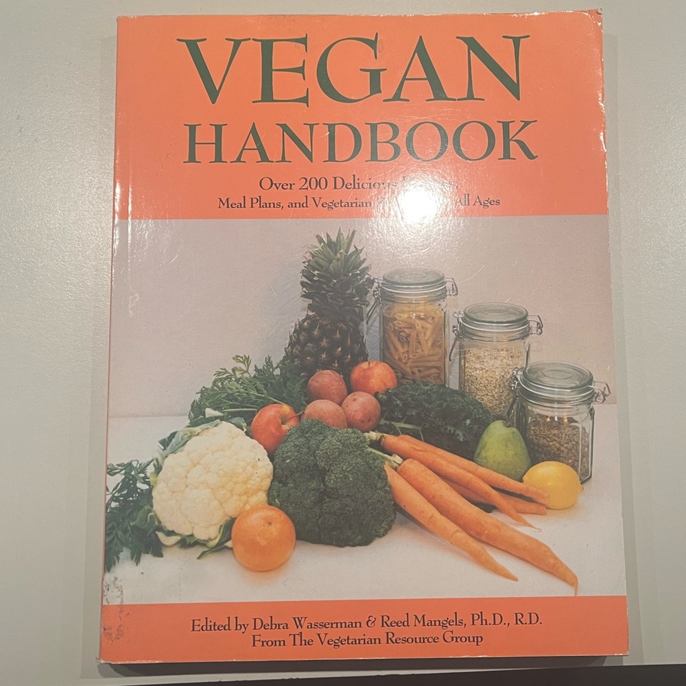 Vegan Handbook cookbook. Barely used, good condition. Published 1996.